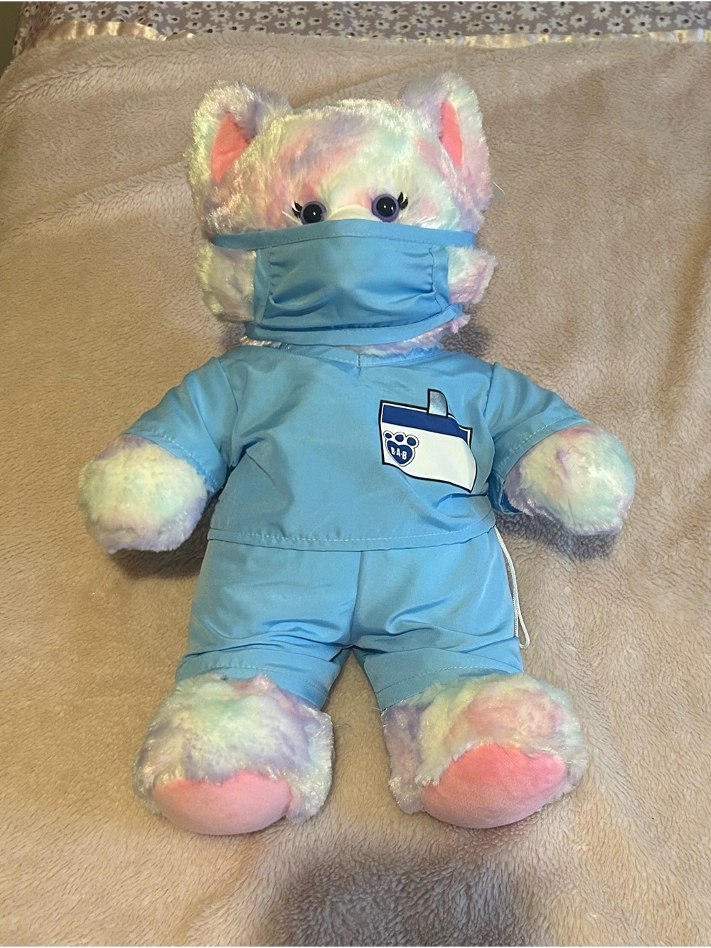 Build-A-Bear Pastel Rainbow Cat in Blue Medical Scrubs with Mask